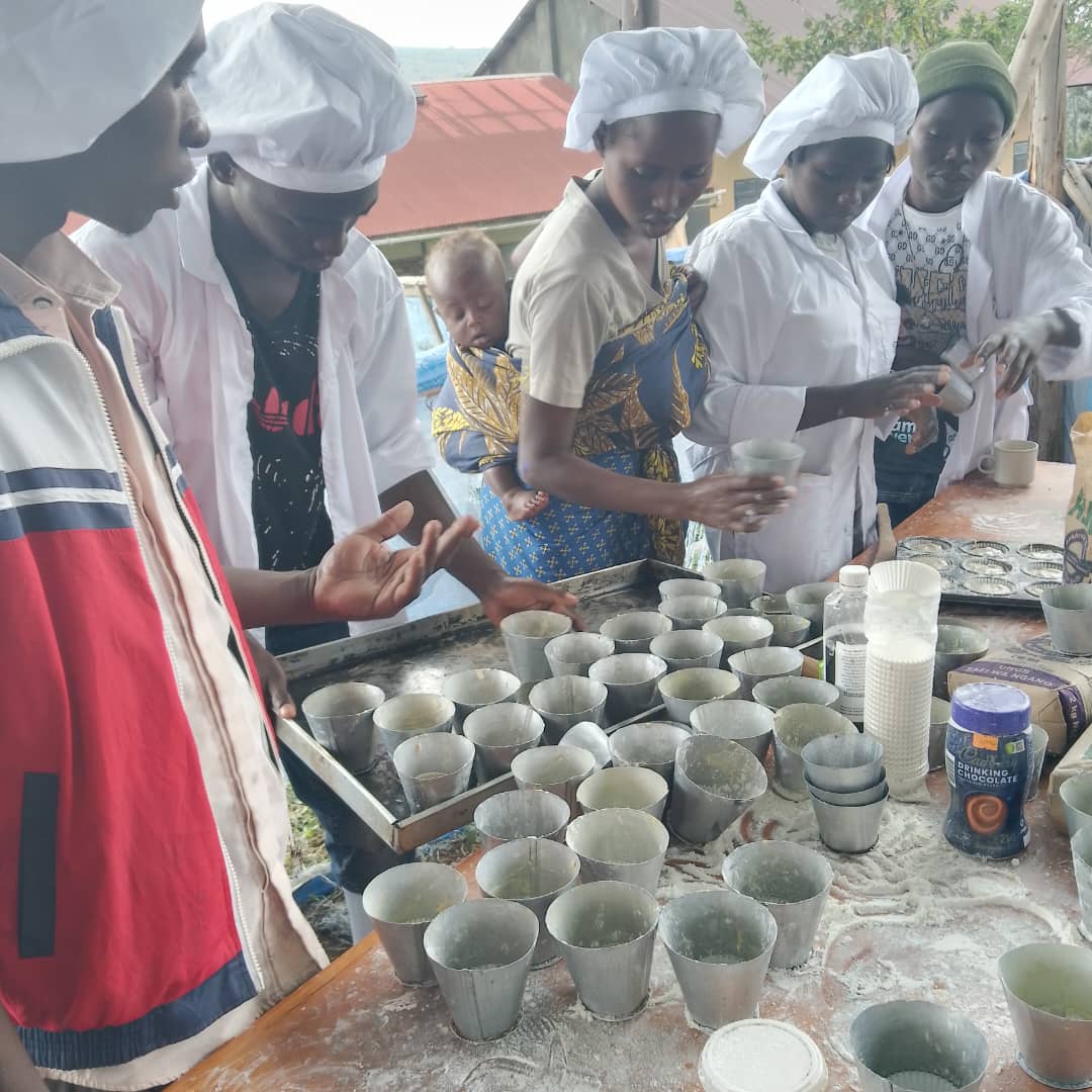 Learners preparing food during catering training