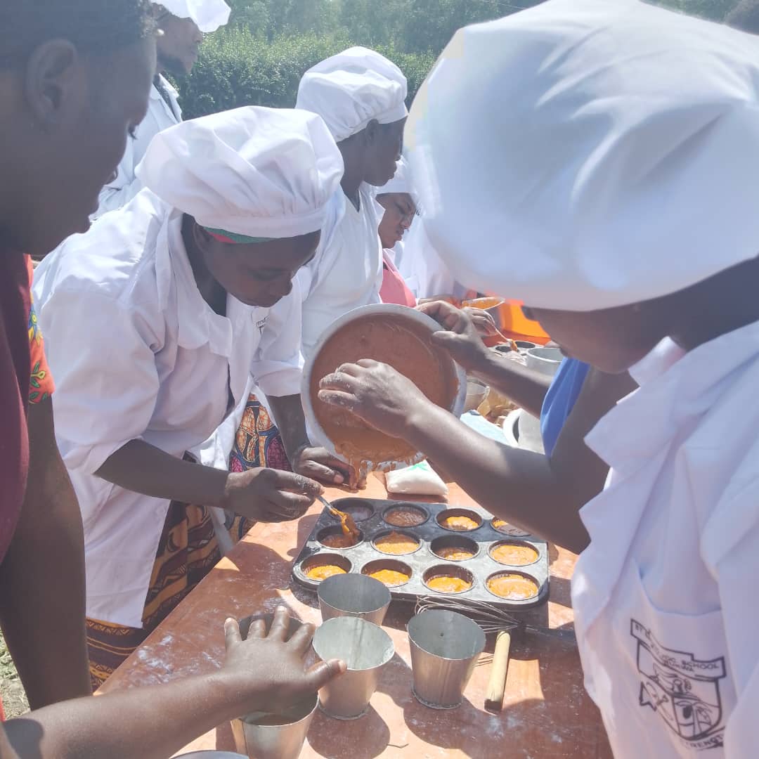 Learners practising baking skills