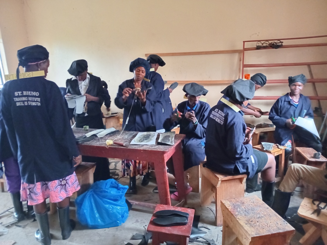 Learners doing practical work in a vocational workshop